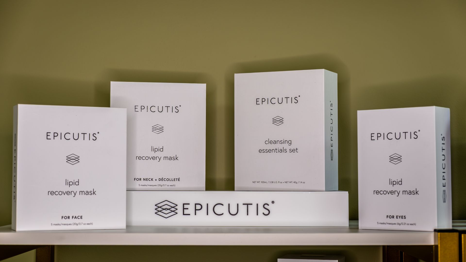 A shelf with boxes of epicutis on it