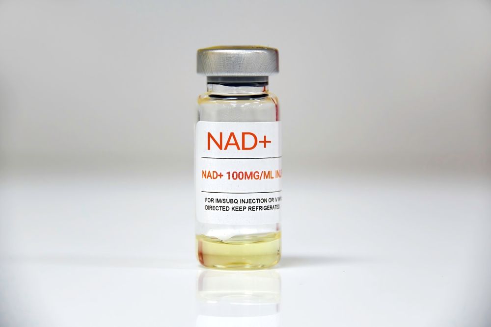 Vial of NAD+ injection solution, labeled with product and dosage information on a white background.