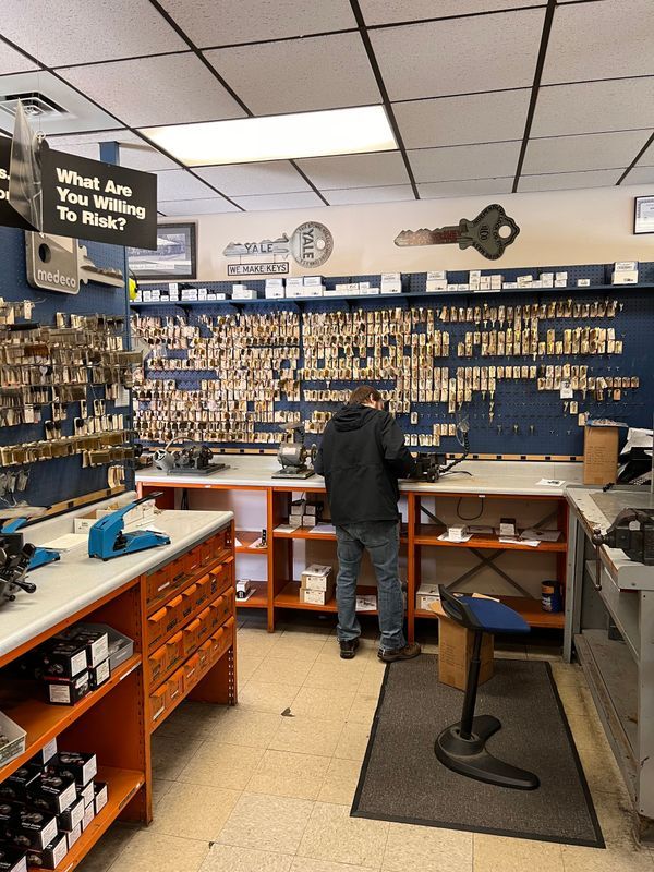 A man is working in a locksmith shop