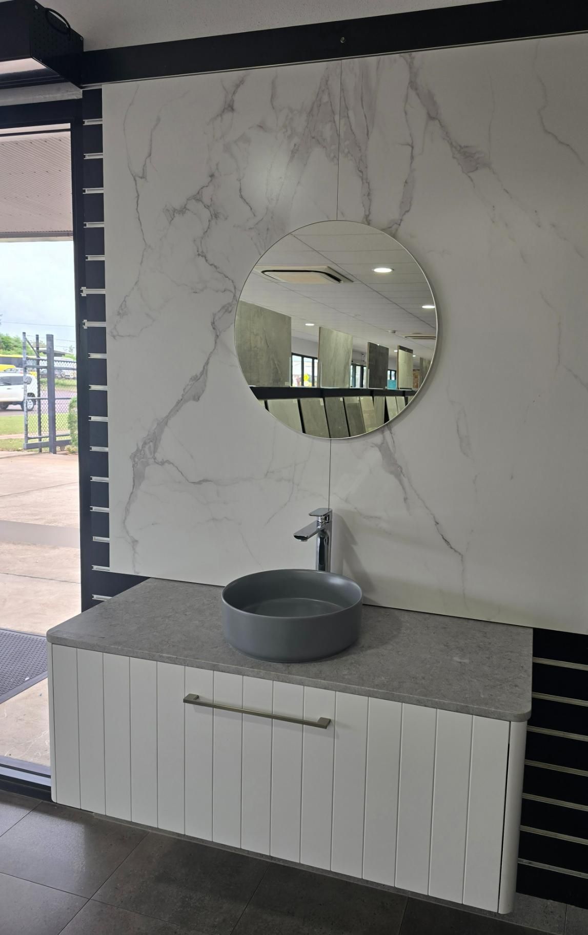 Mirror Attached On The Ceramic Wall — Tiling Service in Winnellie, NT