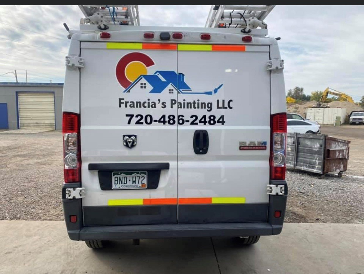Person Removing The Old Wallpapers — Longmont, CO — Francia's Painting LLC