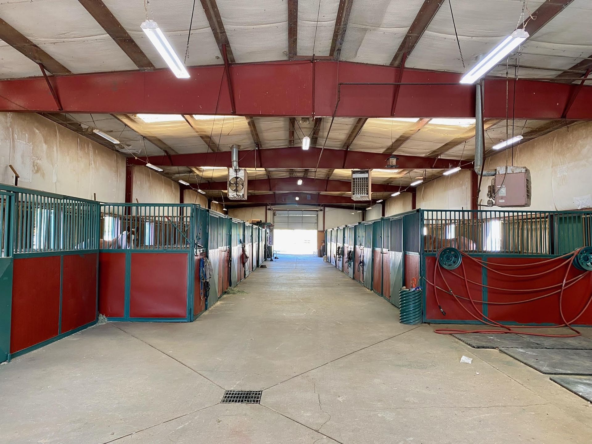 There are a lot of horse stables in this building.