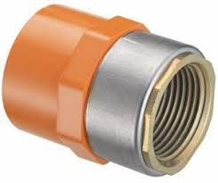 A close up of a brass female connector on a white background.