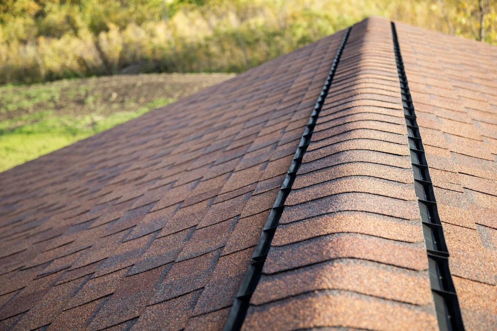 A close up of a roof with shingles on it.