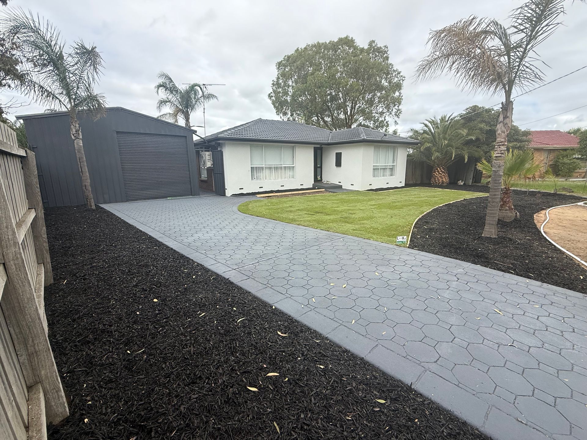 Full driveway restoration in Keilor Downs using Prime Exposure colour sealer by Melbourne Concrete Sealing.