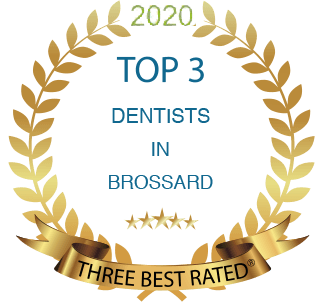 Une couronne de laurier en or qui dit les 3 meilleurs dentistes de Brossard