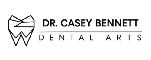 Logo for Dr. Casey Bennett Lowcountry Dental Arts, featuring a stylized tooth graphic and text.
