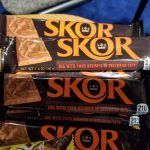 A stack of skor bars sitting on top of each other on a table.