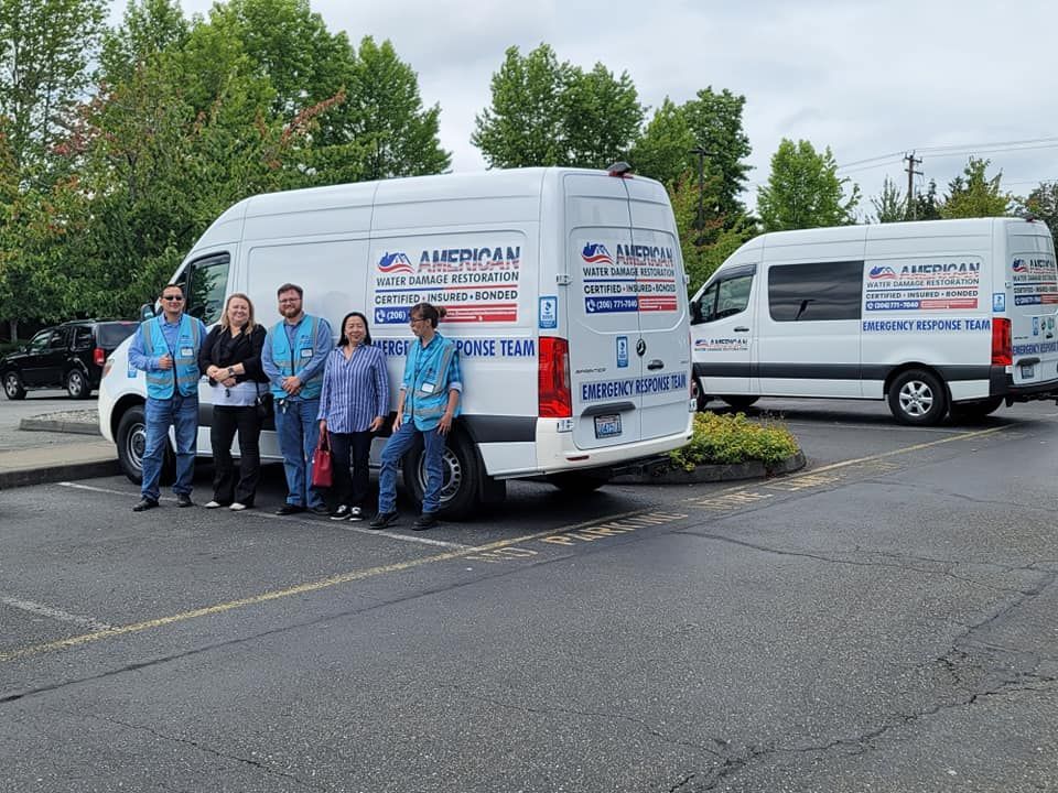 american water and damage restoration team with mobile