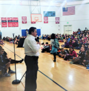 Mark Speaking to School Students