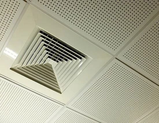 A Close Up of a Ceiling Vent With Holes in It — BJ Heating & Cooling in South Albury, NSW