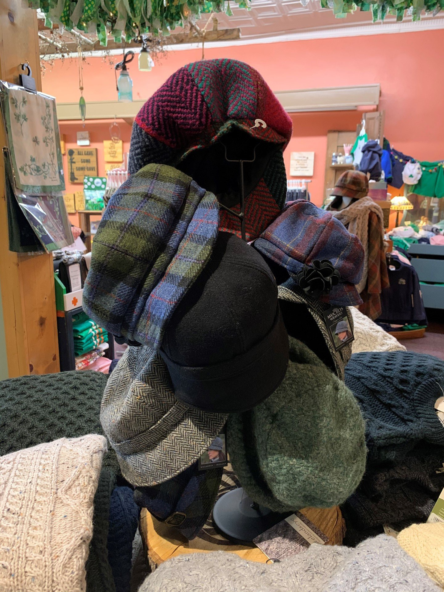 a bunch of hats are on display in a store