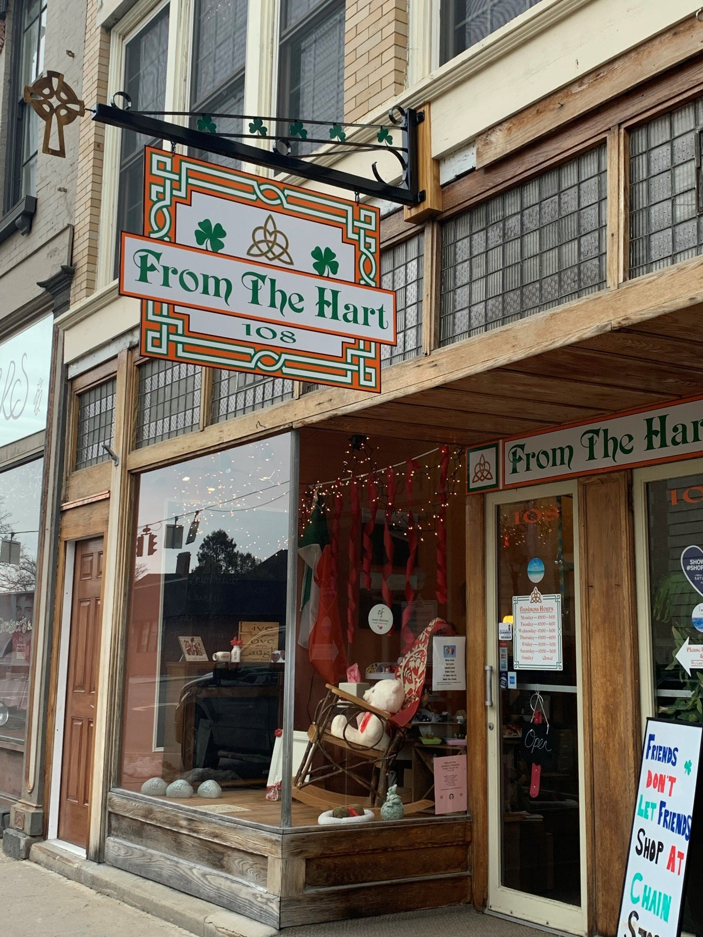 a store front with a sign that says `` from the hart '' on it .