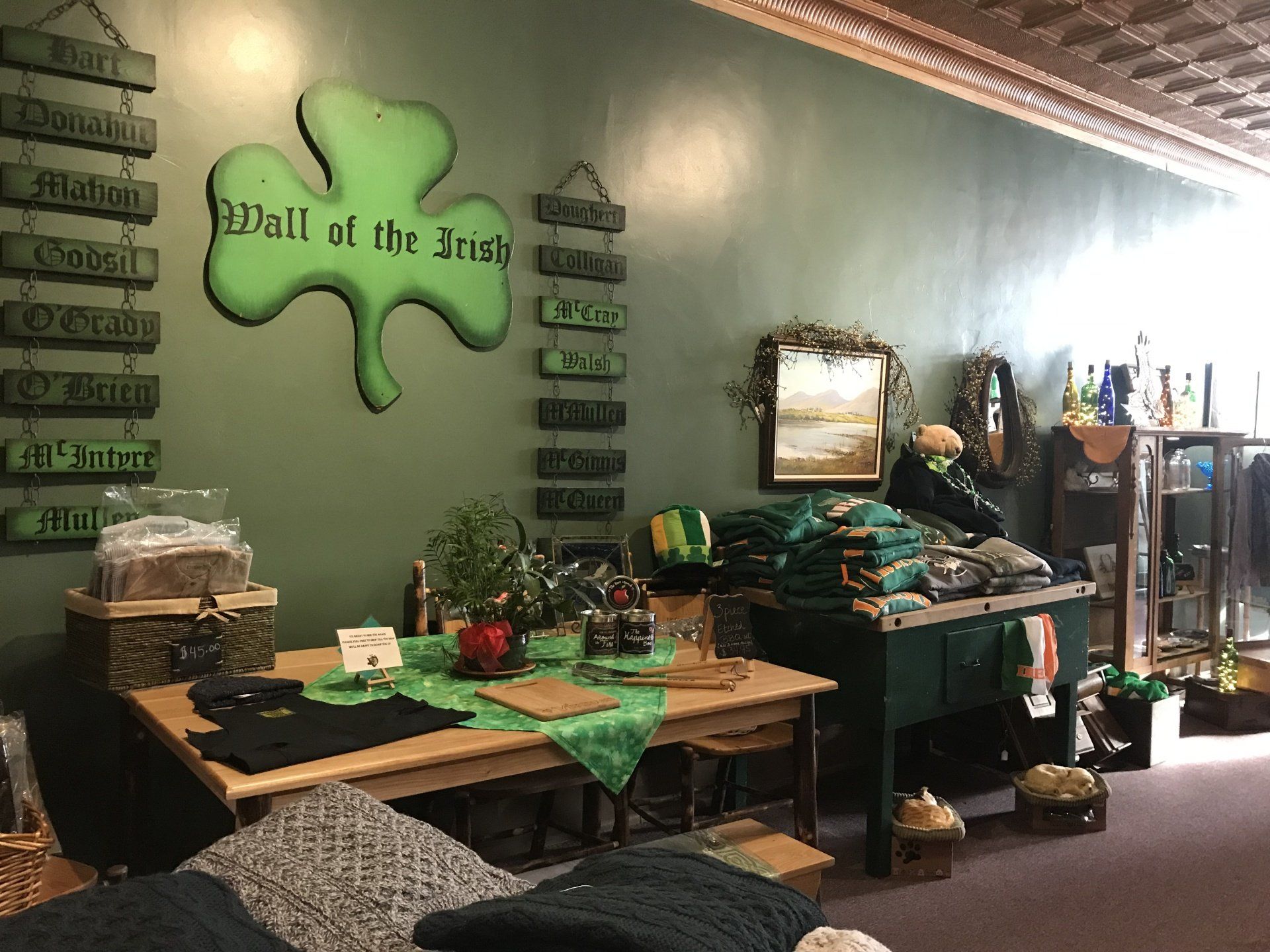 a room with a clover on the wall that says wall of the irish