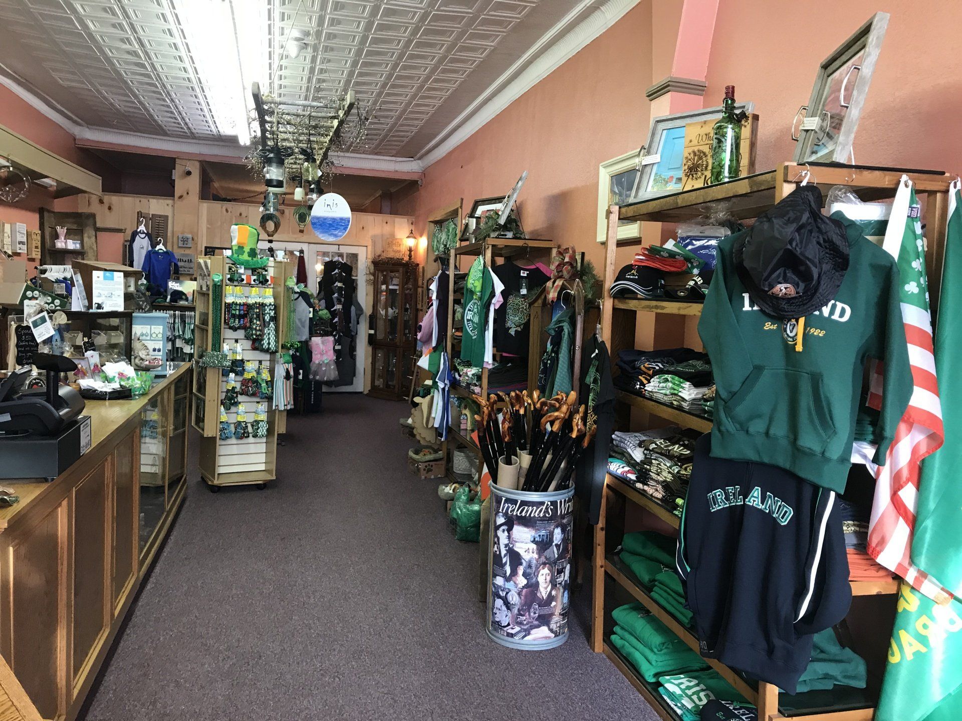 a store filled with lots of clothes and flags