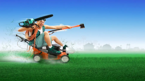 Male Person rides a lawnmower, holding a chainsaw and axe, surrounded by grass clippings, with houses in the background.