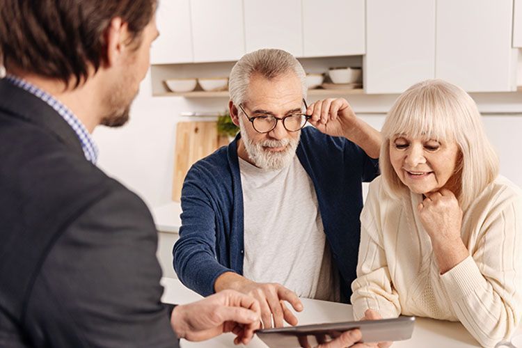 image of couple reviewing retirement papers