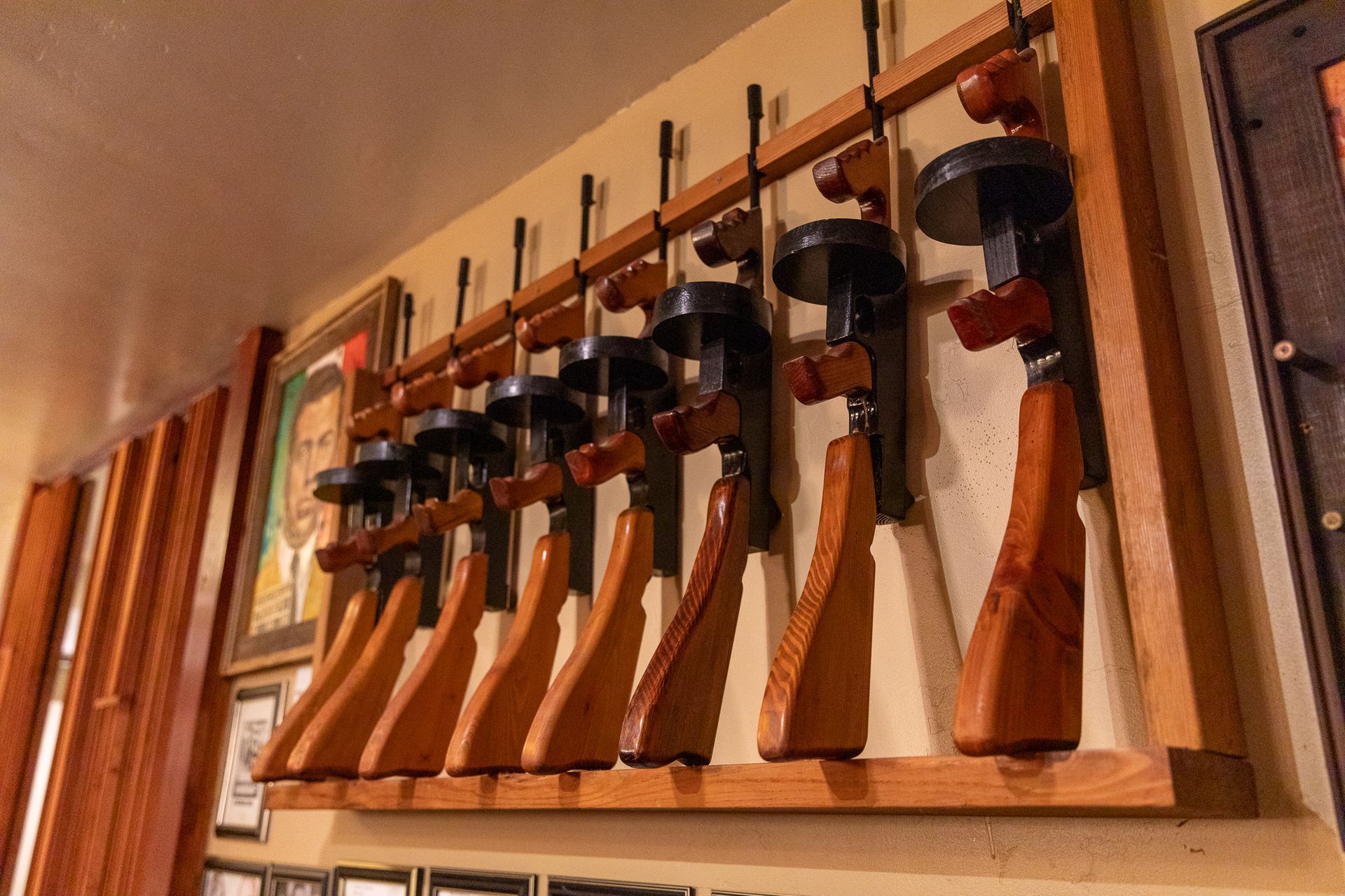 a wall display of fake Thompson submachine gun