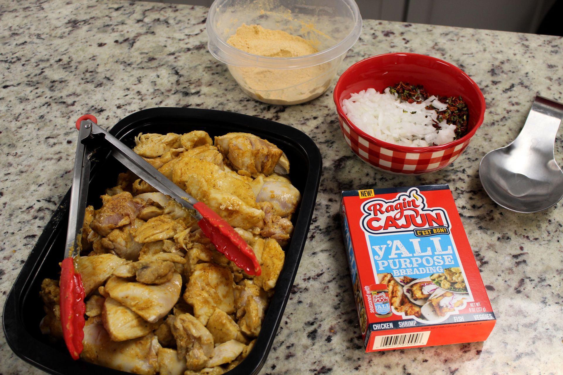 Ragin' Cajun y'ALL Purpose Breading being used for Smothered Chicken