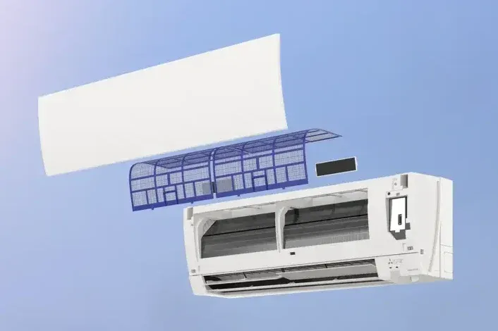 Exploded view of a white air conditioner unit with removed filters, showing internal components.
