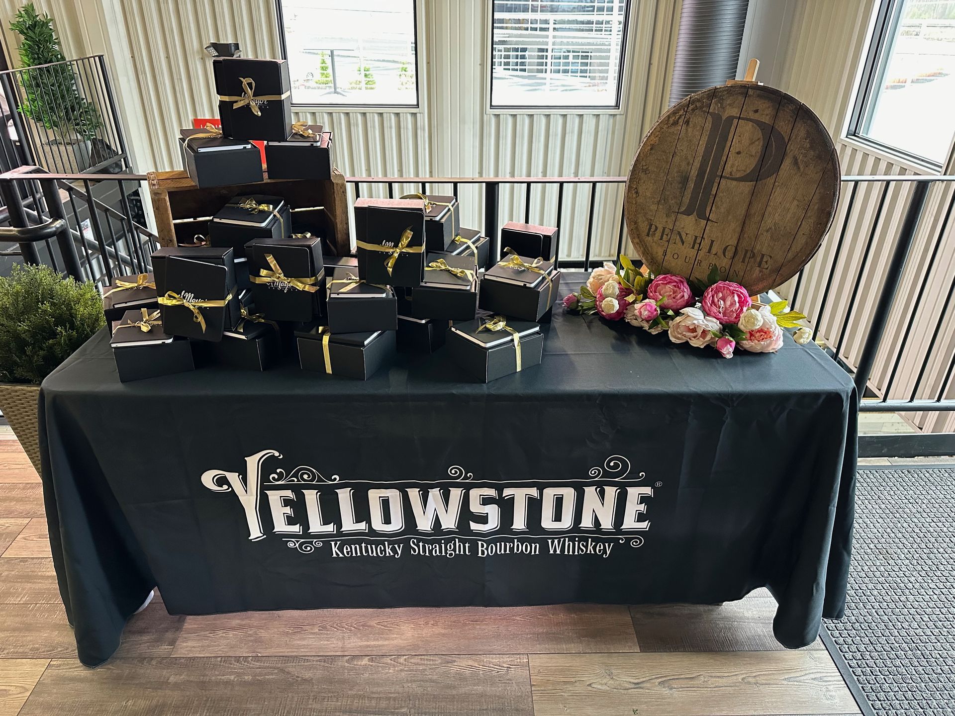 A table with a black table cloth that says yellowstone on it