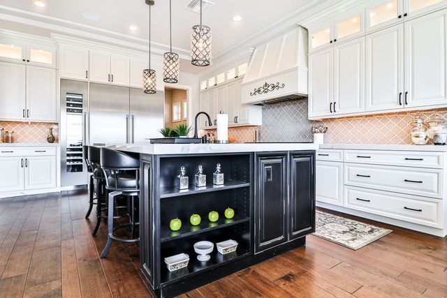 Granite countertops with custom cabinetry by West Coast Cabinets