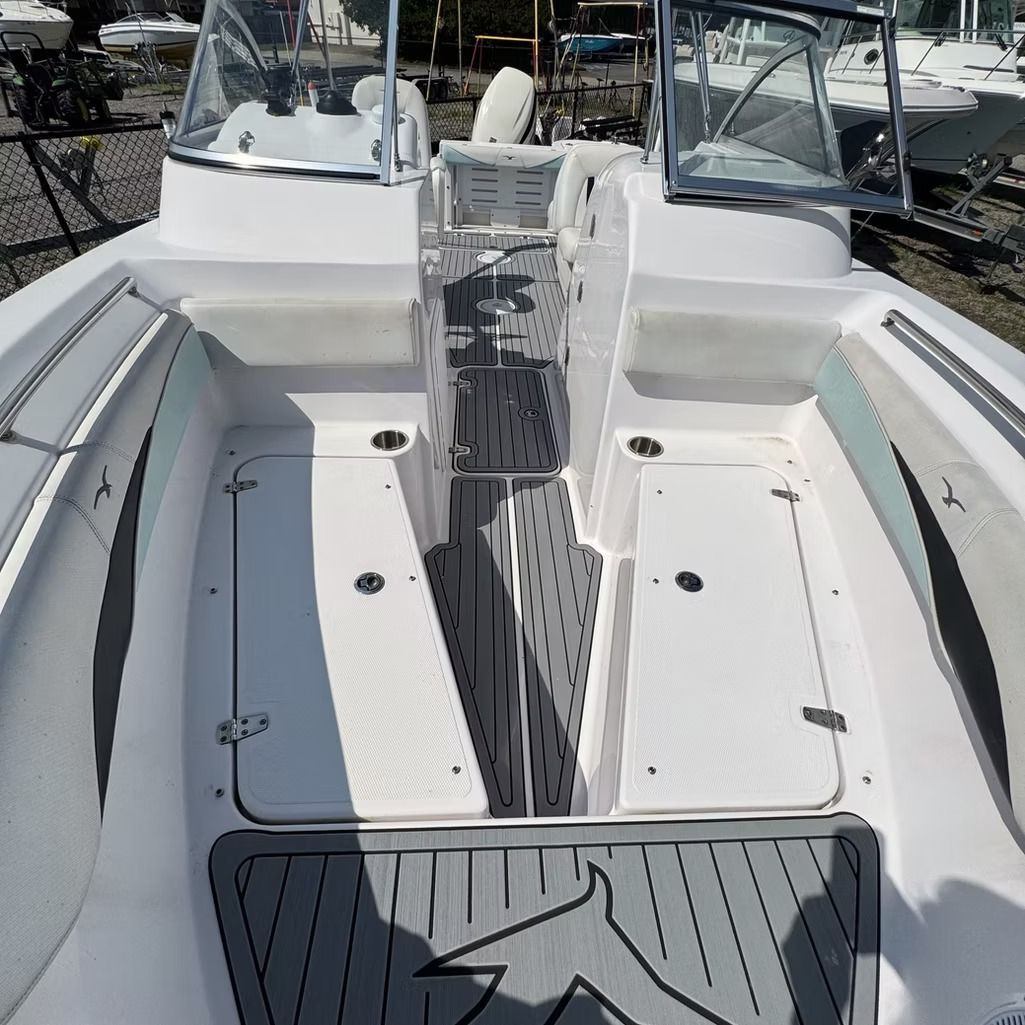 White boat interior with a grey mat.