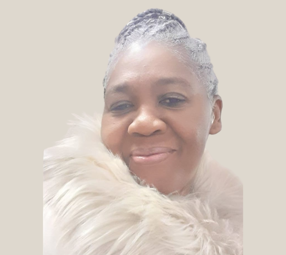 A silhouette of a woman without a face on a blue background