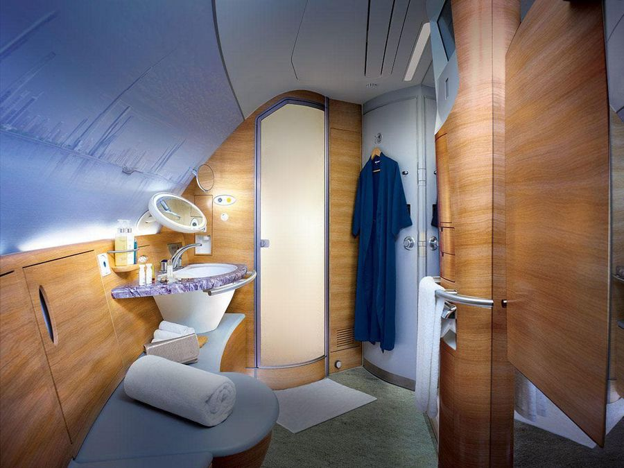 Emirates A380 First Class shower spa cabin with private bathroom and vanity – xLuxuryFlights.com