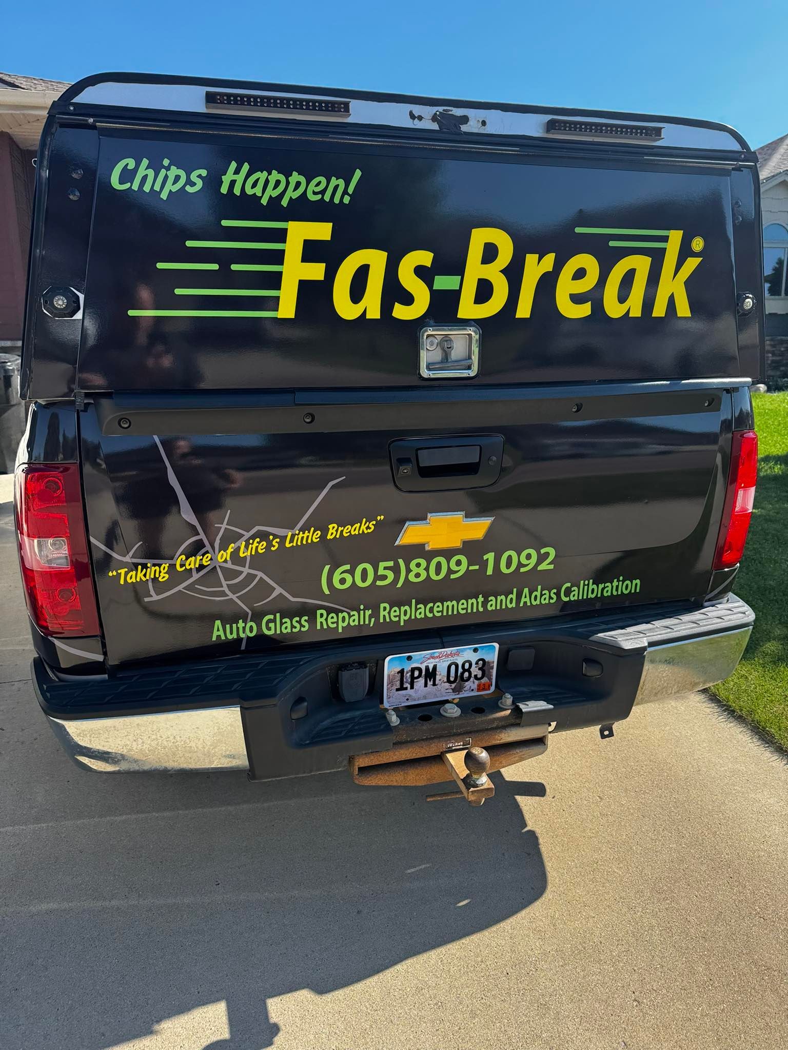 A black Chevrolet pickup truck displays 