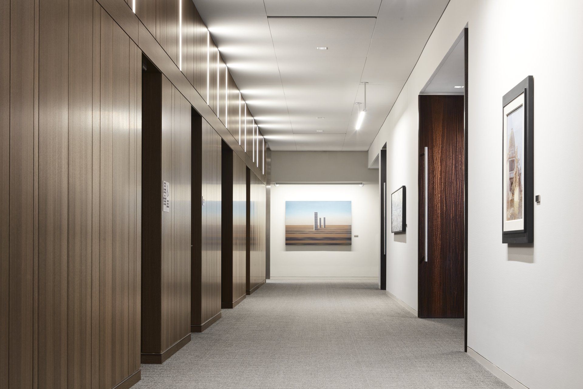 An artist 's impression of a hallway with a painting on the wall.