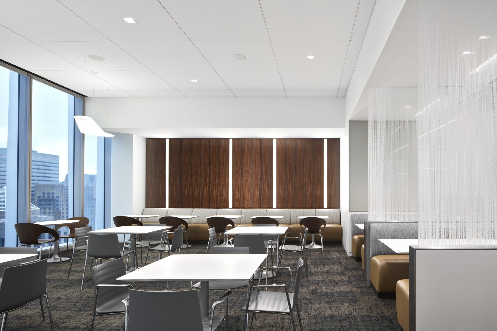 An artist 's impression of a restaurant with tables and chairs