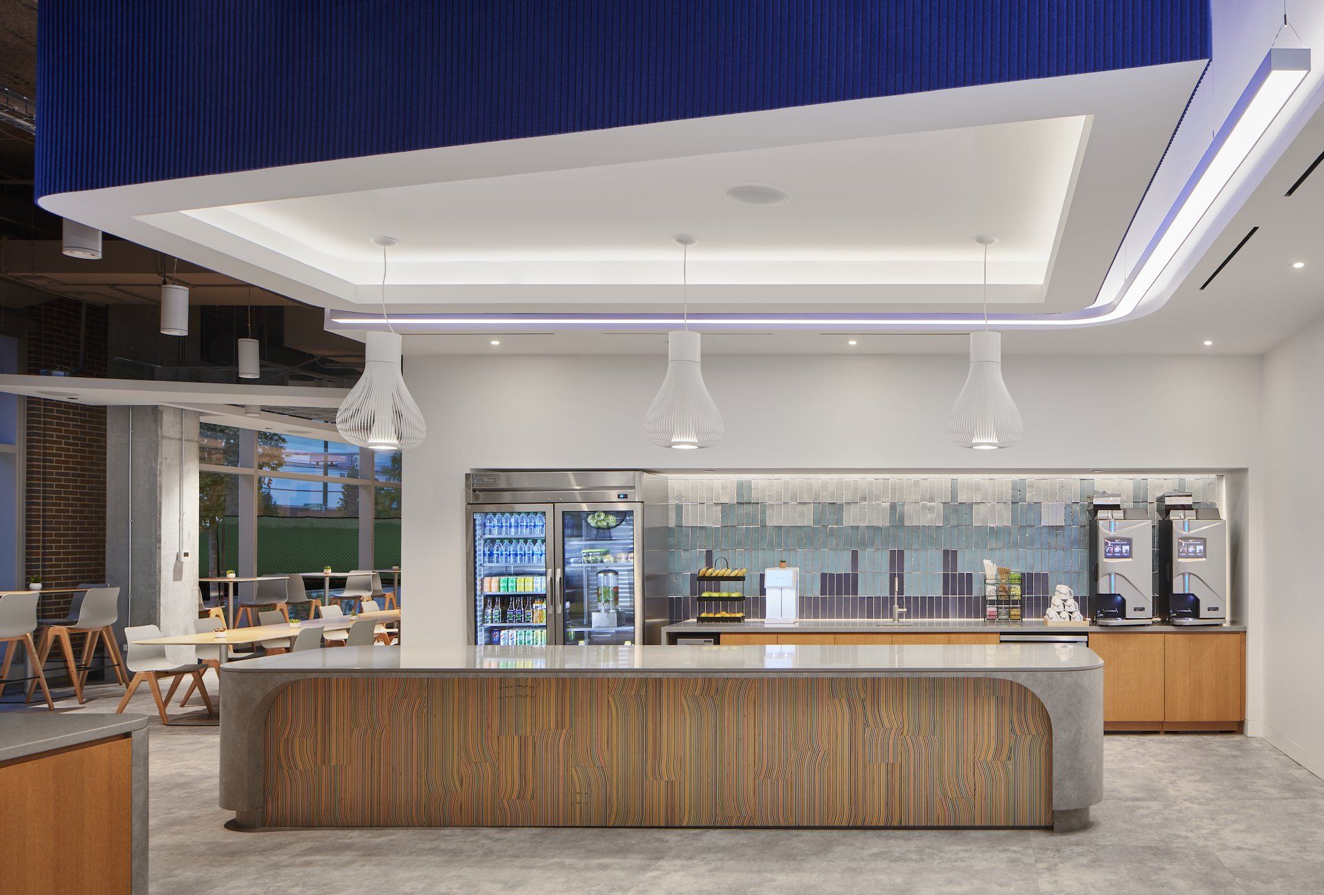 There is a large counter in the middle of the room.