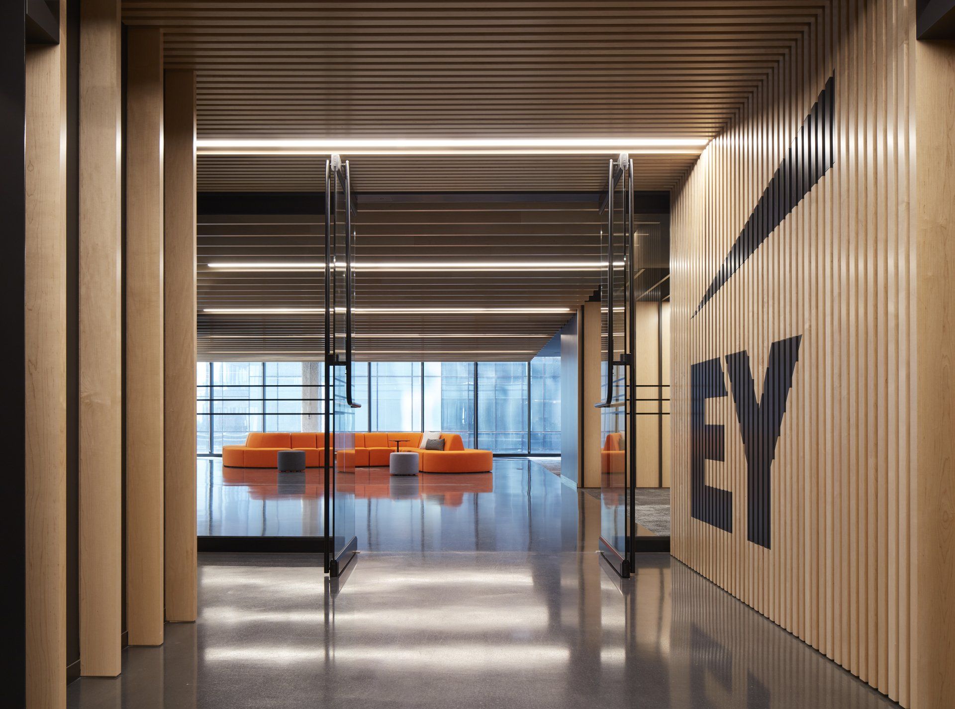 A hallway with a wooden wall and the word ey on it.