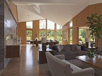 A living room filled with furniture and a fireplace.