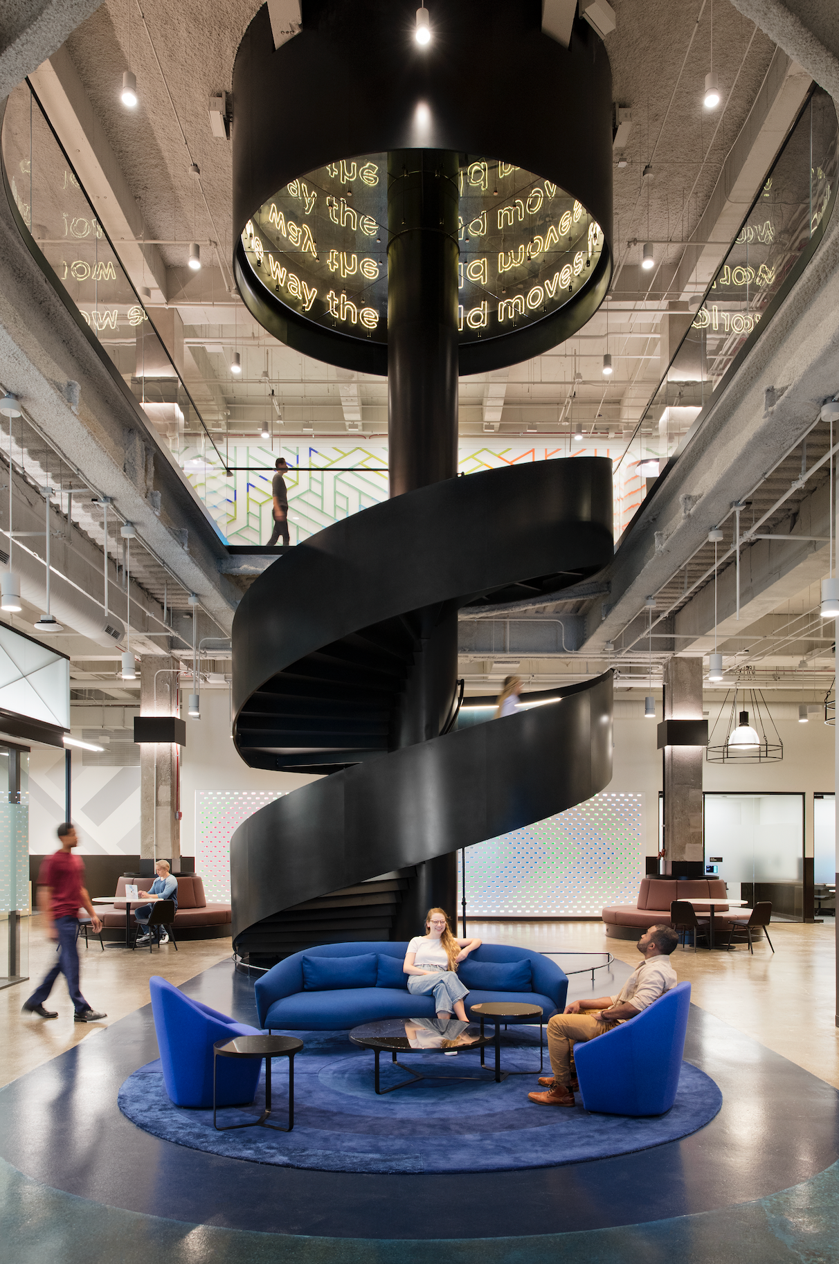 There is a spiral staircase in the middle of the room.