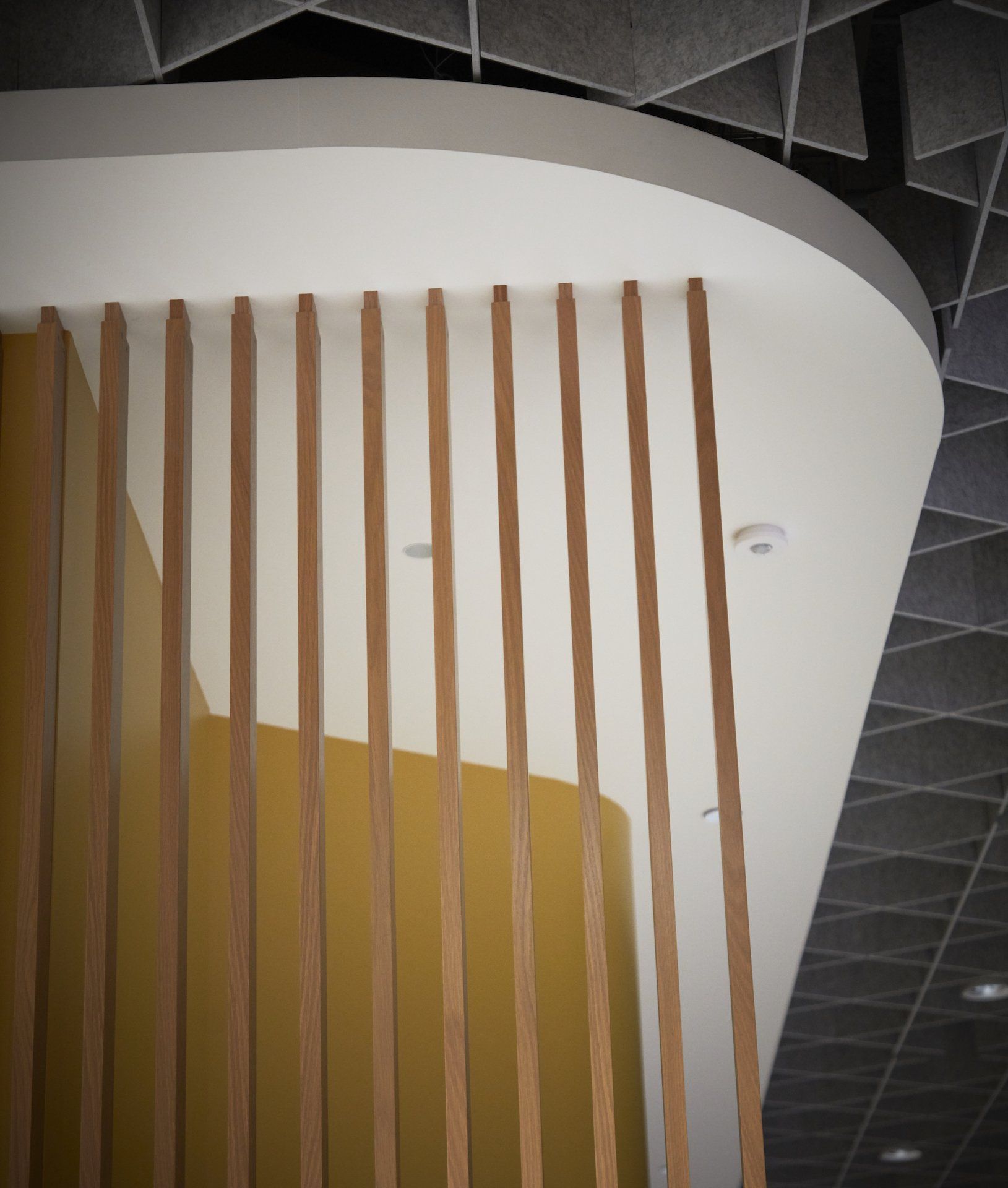 A close up of a wooden fence in a room