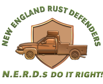 A logo for new england rust defenders shows a truck on a shield