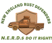 A logo for new england rust defenders shows a truck on a shield