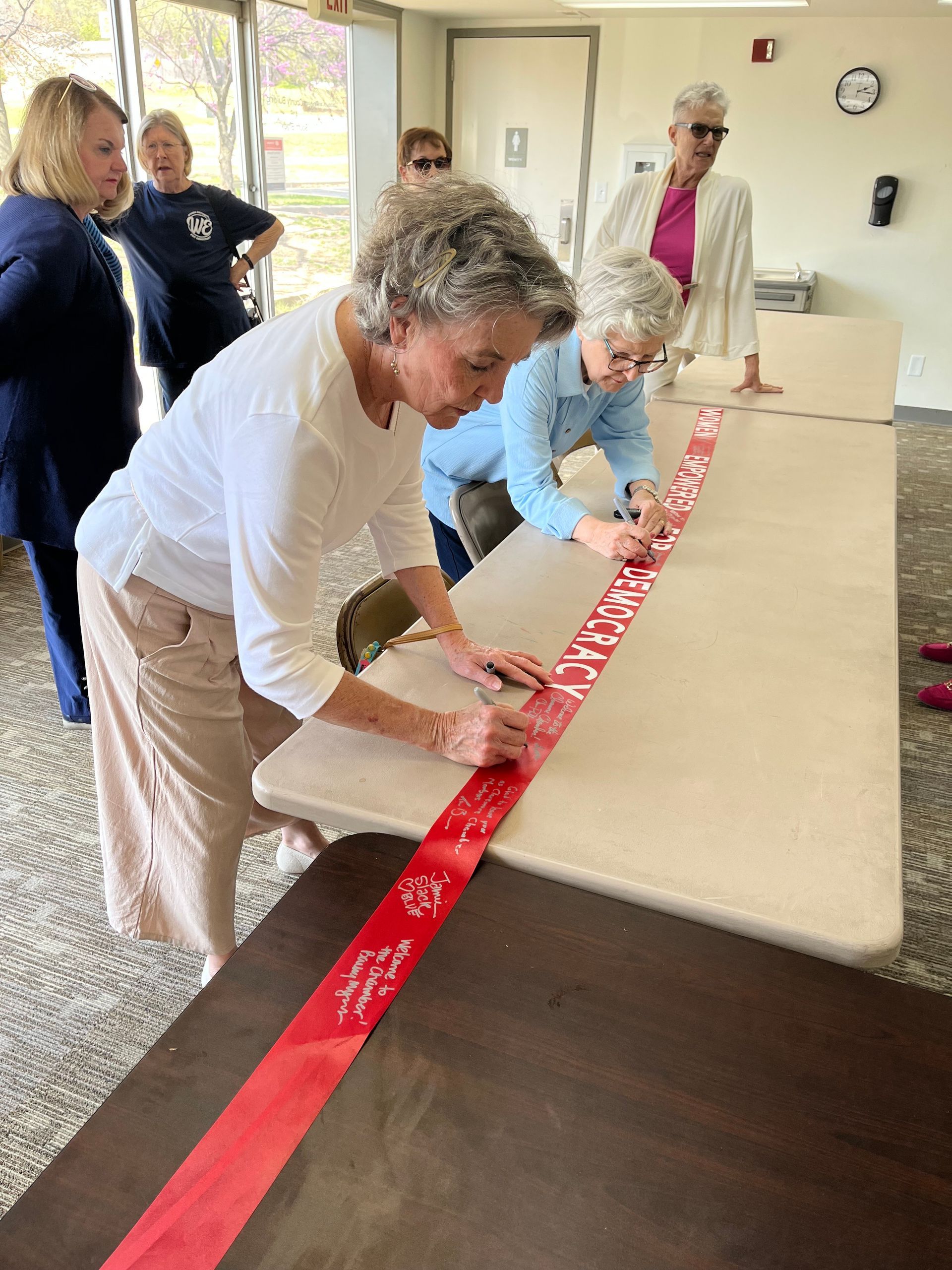 Signing the ribbon on the day the Claremore Chamber of Commerce welcomed us as members. 