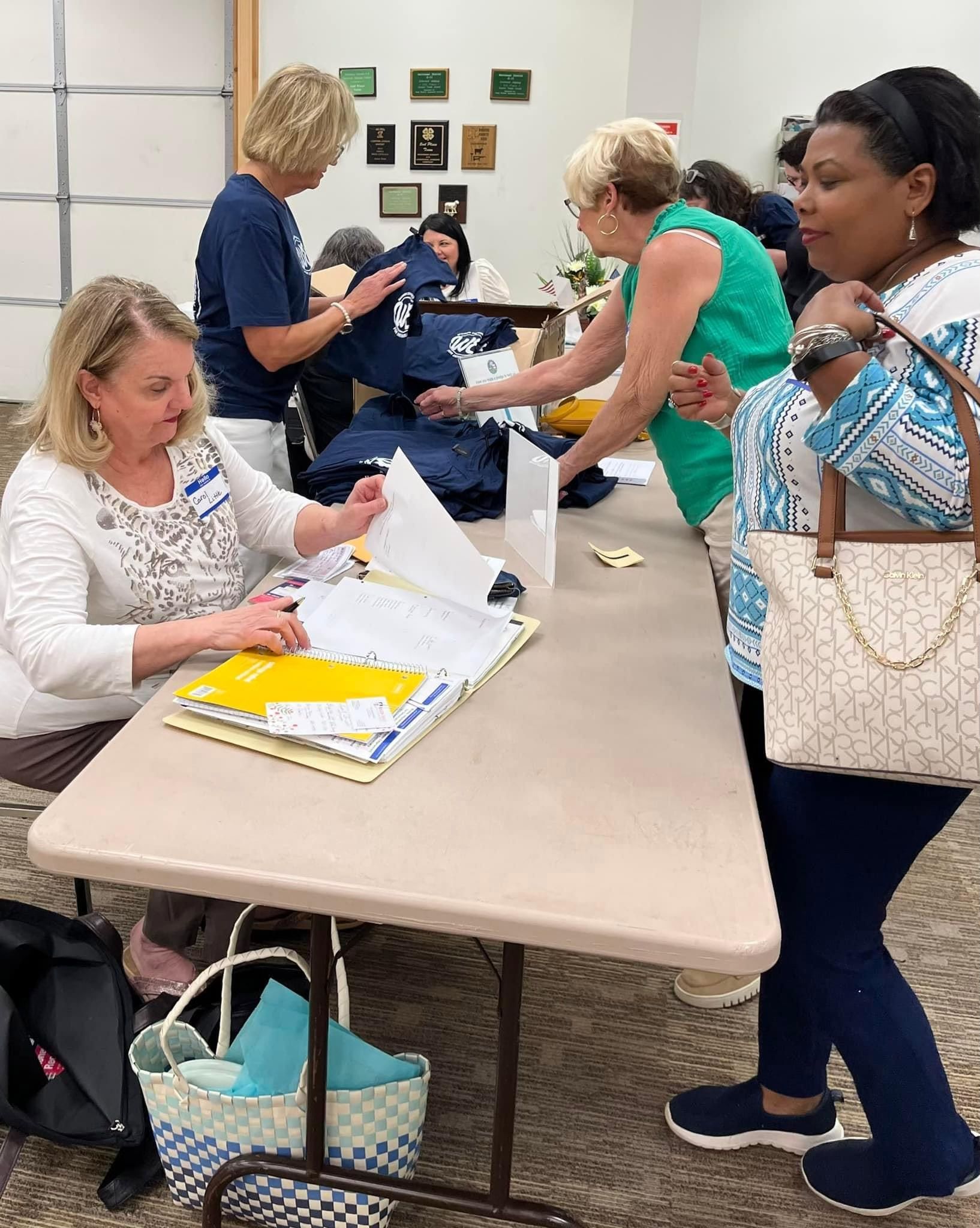 Women Empowered for Democracy meeting: Members signing in
