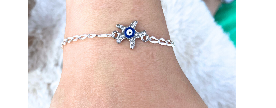 Sterling Silver permanent bracelet with starfish charm