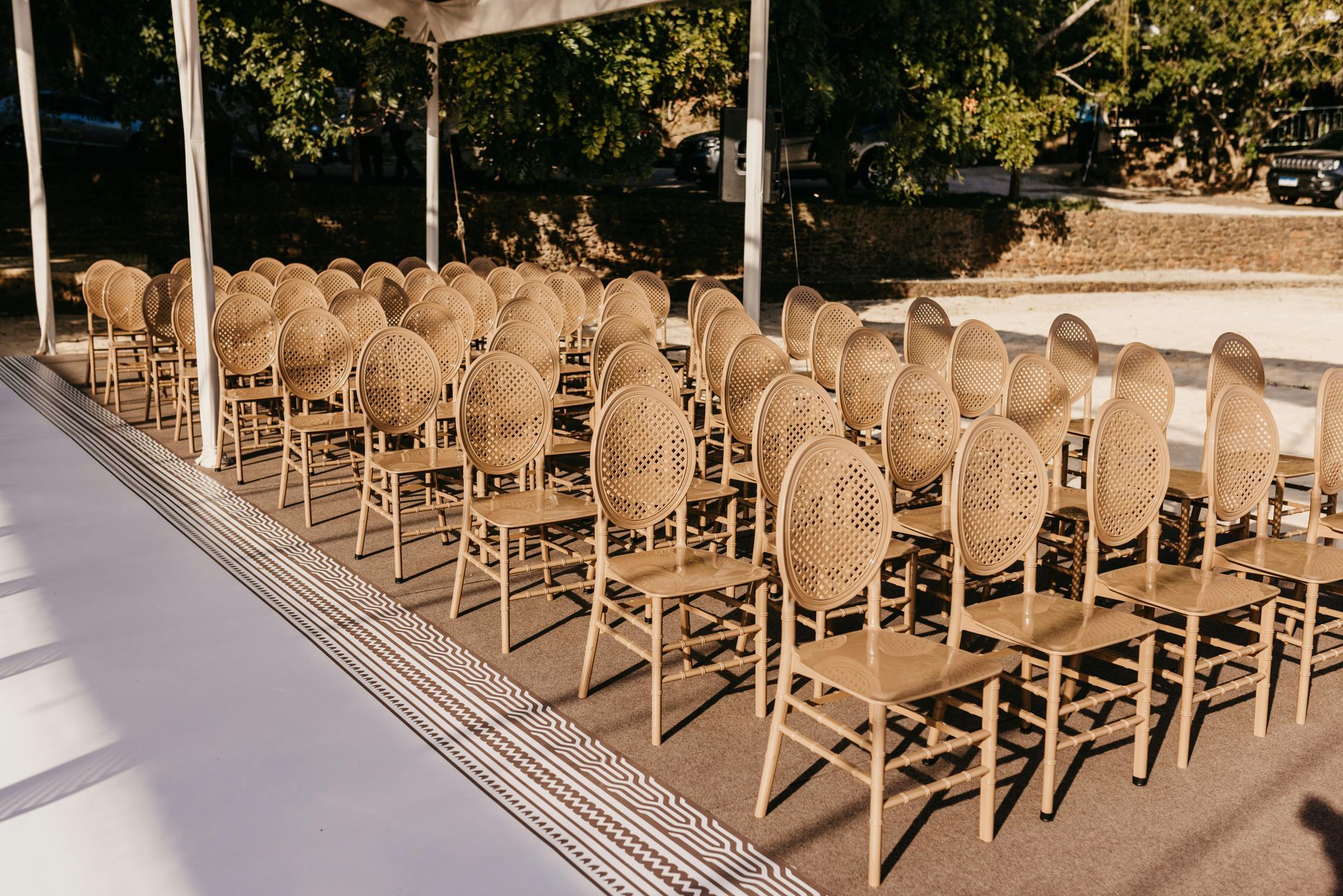 Elegant outdoor event space with covered pavilion and pro seating setup for milestone celebrations