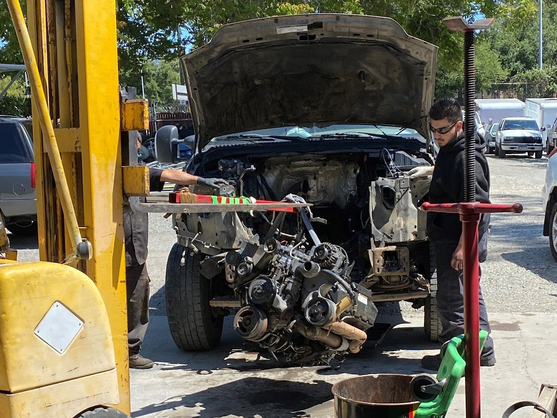 The Man Is Repairing An Engine Of A Truck - San Jose, CA – SOS Auto Repair