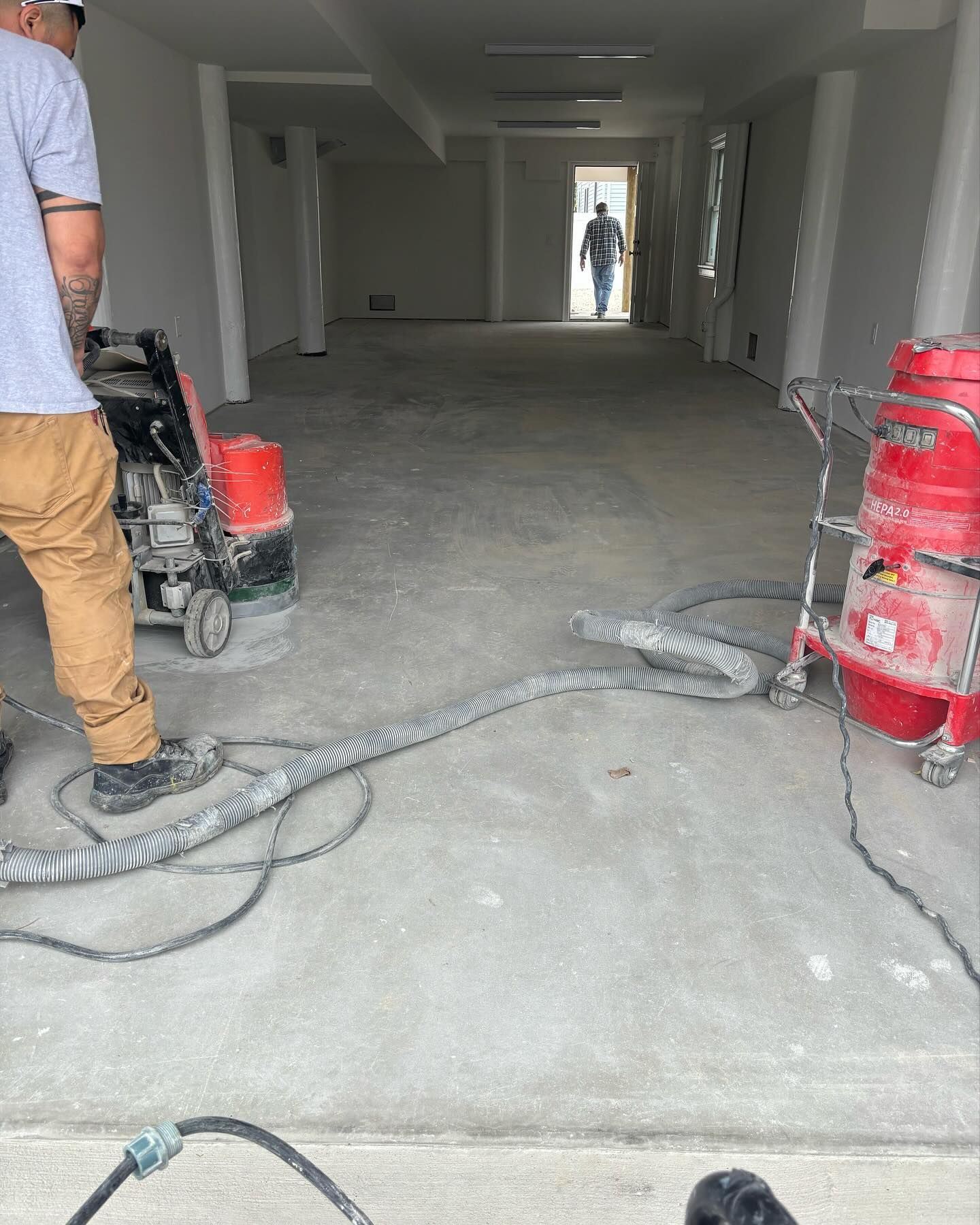 A close up of a painting of a river with a reflection of a mountain in the water.