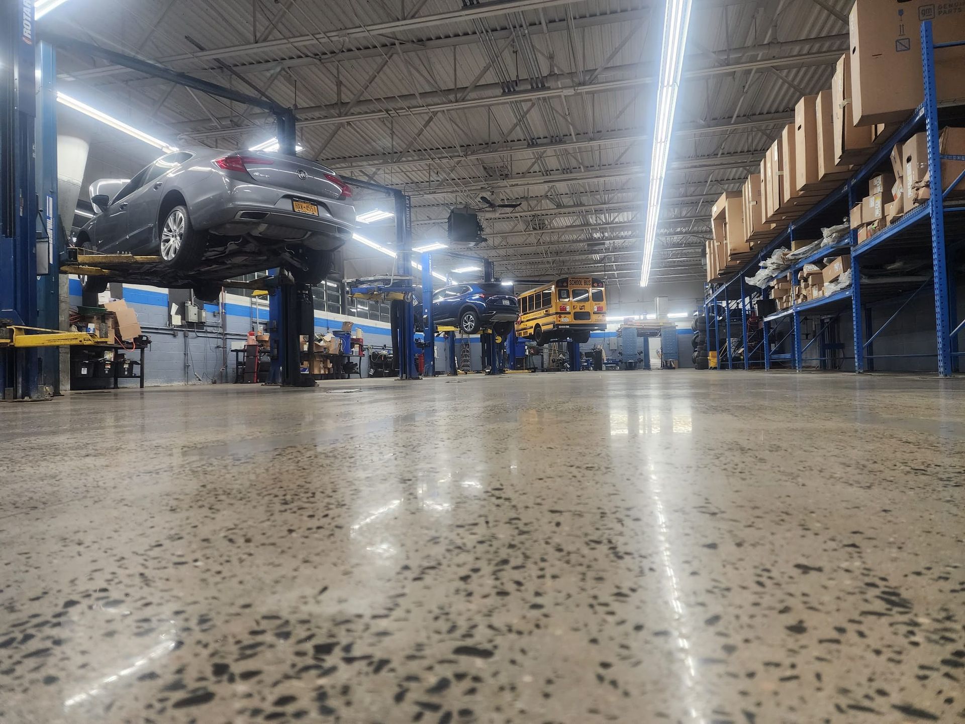 A close up of a painting of a river with a reflection of a mountain in the water.