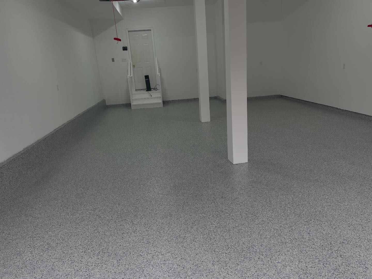 There is a staircase in the corner of the room.
