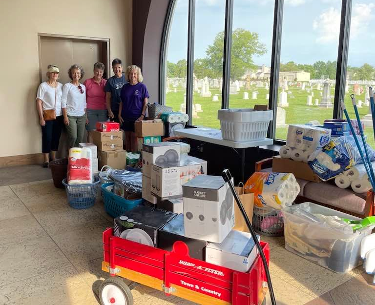 Women with a Mission prepared to drop off donations.