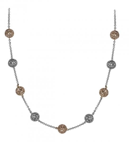 Gold and silver beaded necklace with circular charms on a white background