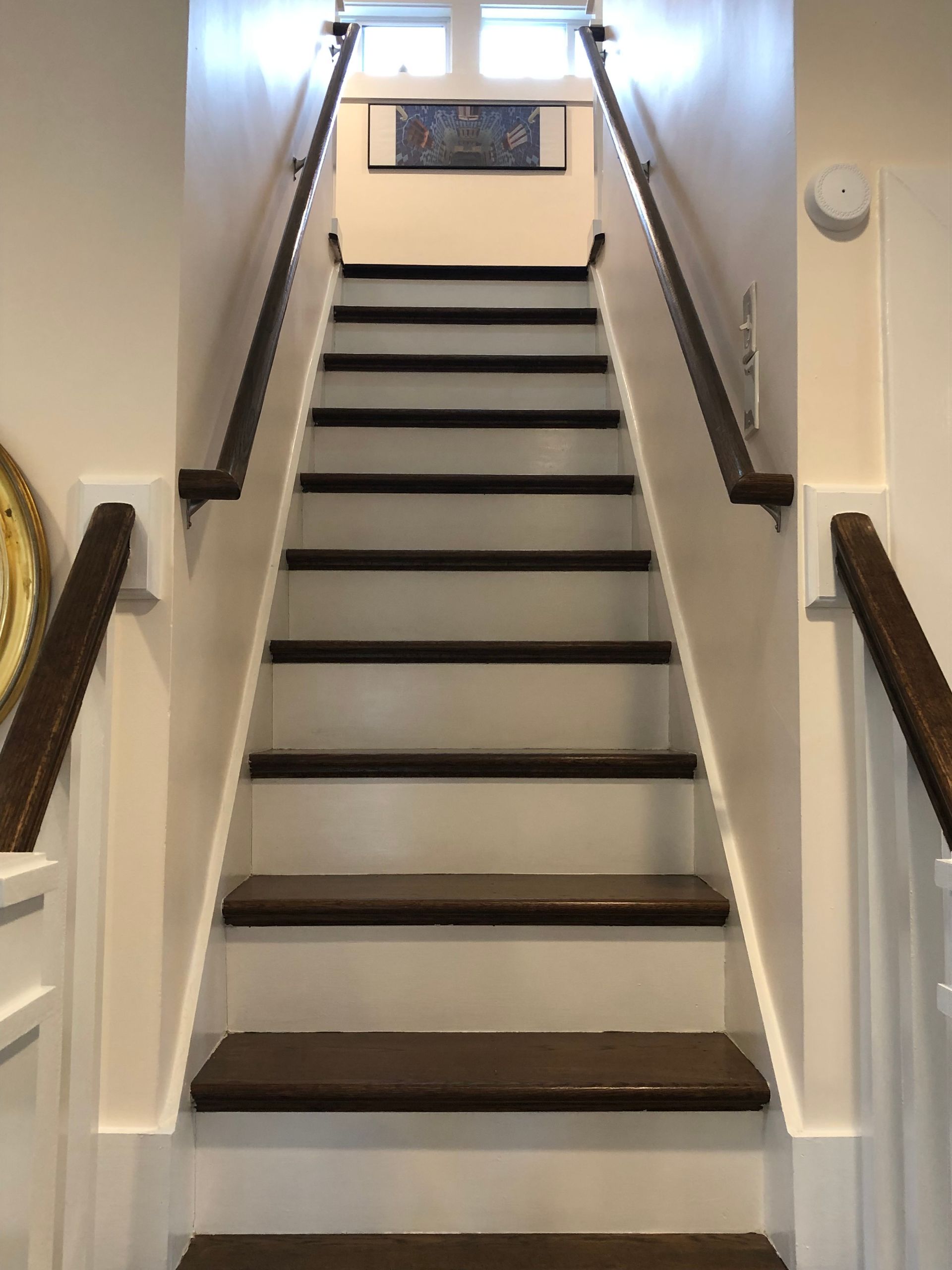 A set of stairs leading up to the second floor of a house.